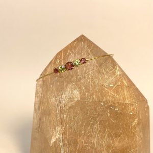 Bracciale semirigido in oro giallo con tormaline